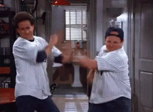 jerry-and-george-fake-fight-in-seinfield-13jyi8ayhwc7any0.webp