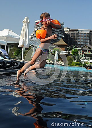 child-jumping-pool-6425026.jpg